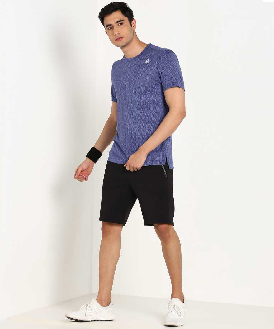 REEBOK Self Design Men Round Neck Blue T-Shirt
