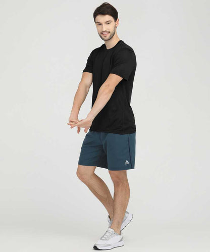 REEBOK Solid Men Round Neck Black T-Shirt